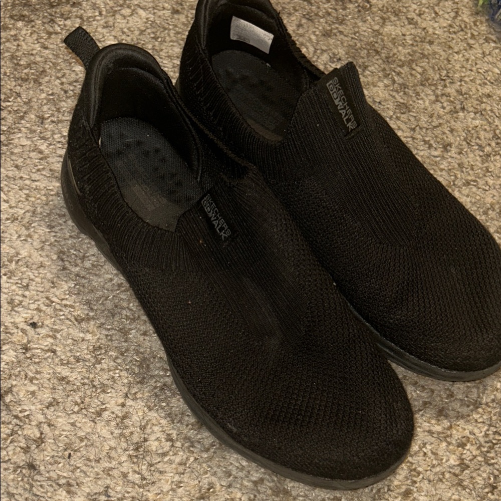 Skechers women’s Black Knit Slip-On Sneakers